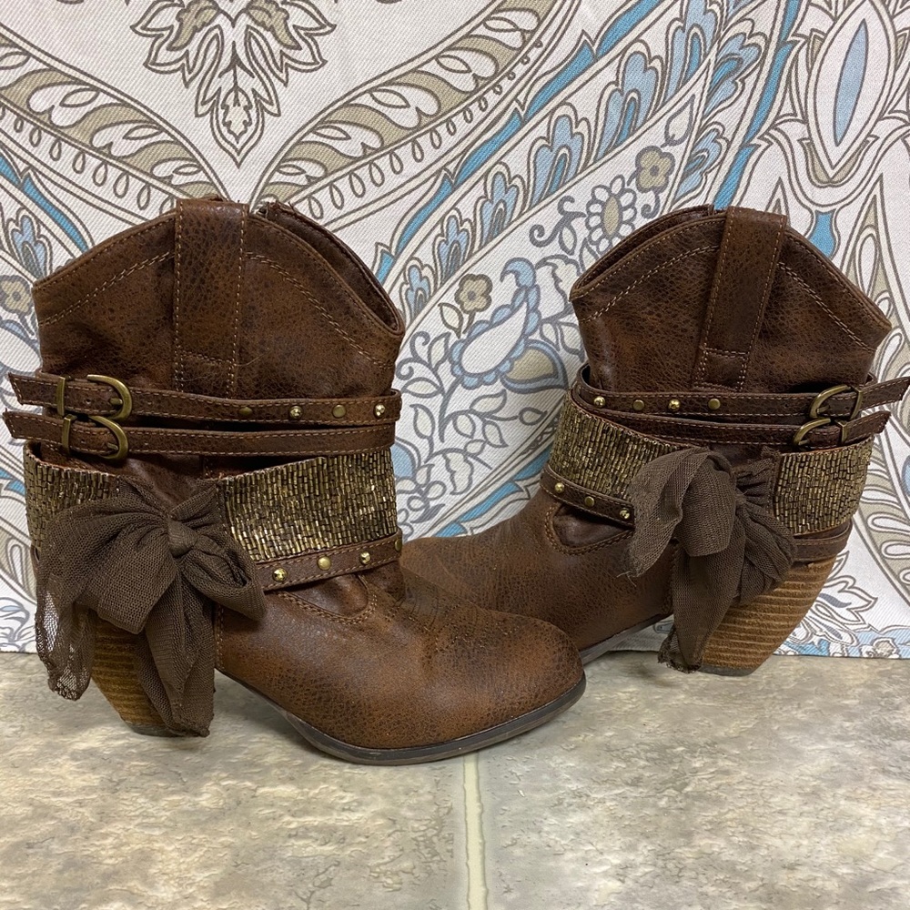 Not Rated short boots. Look at the jazz on them!